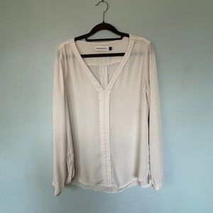 Cream colored long sleave v neck blouse